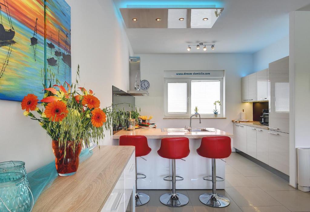 Cuisine ou kitchenette dans l'établissement Villa Sky Dream