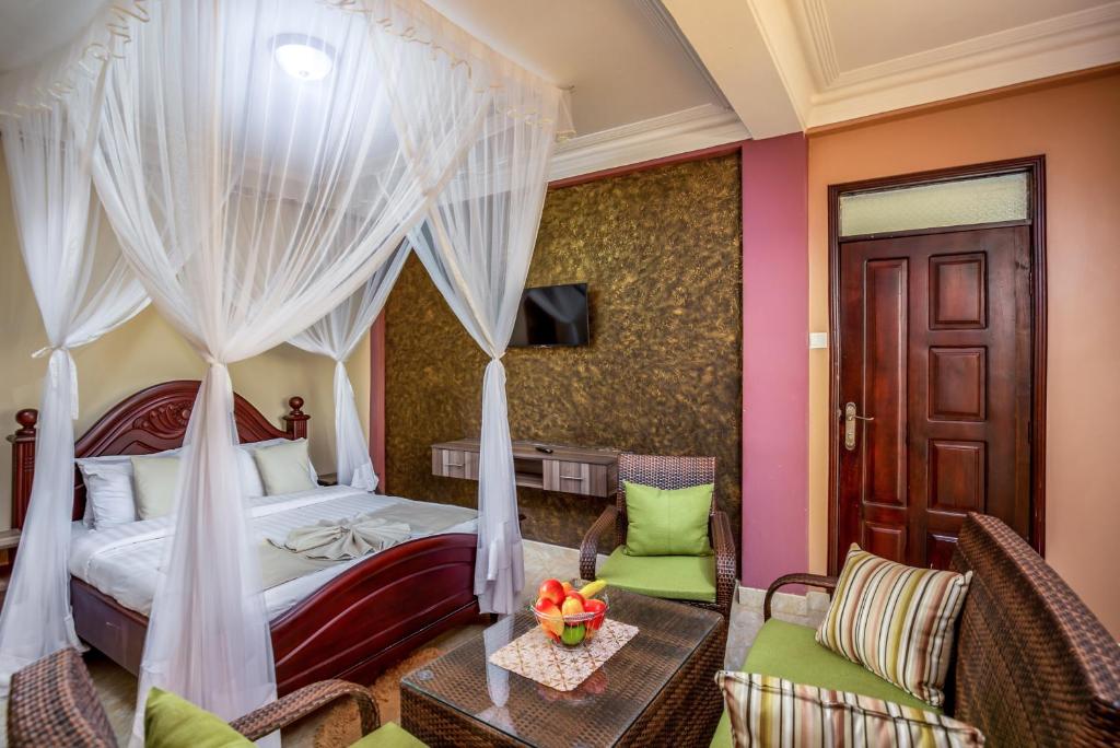 Postel nebo postele na pokoji v ubytování Keba Xpress Hotel - Entebbe
