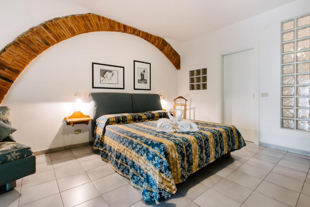 Säng eller sängar i ett rum på Agriturismo Casa Andreina