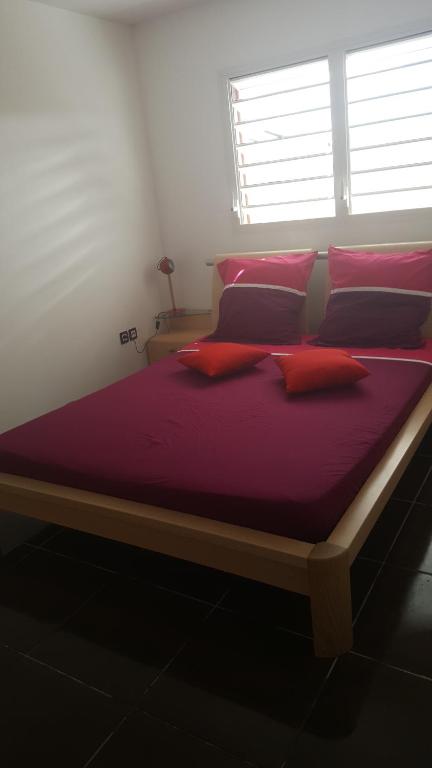 En eller flere senge i et værelse på Air Marin Vue sur mer