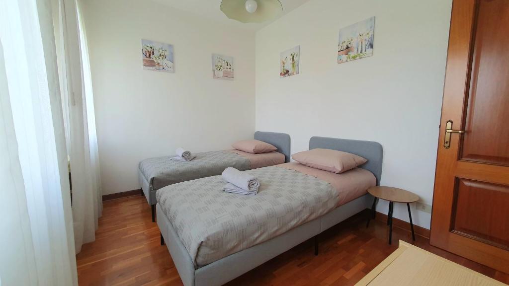 Postel nebo postele na pokoji v ubytování NIKO casa - 3 bedroom townhouse