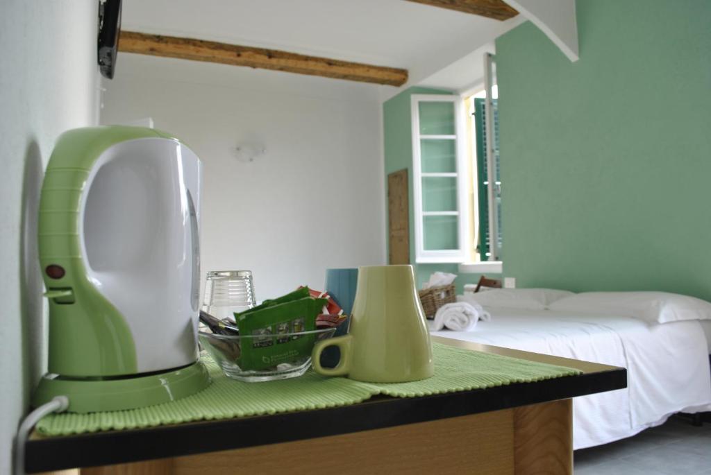 Фотография из галереи Al Piccolo Scoglio - Room & Breakfast в Камольи