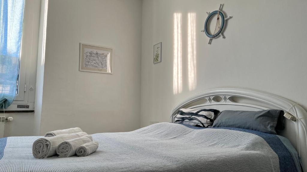 Postel nebo postele na pokoji v ubytování B&B Ligustico