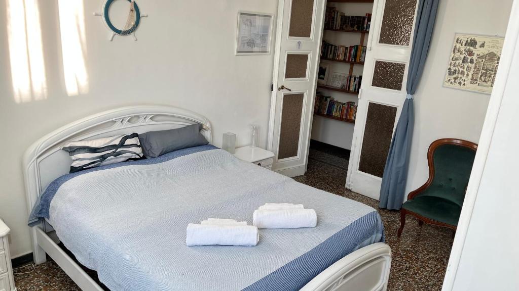 Postel nebo postele na pokoji v ubytování B&B Ligustico