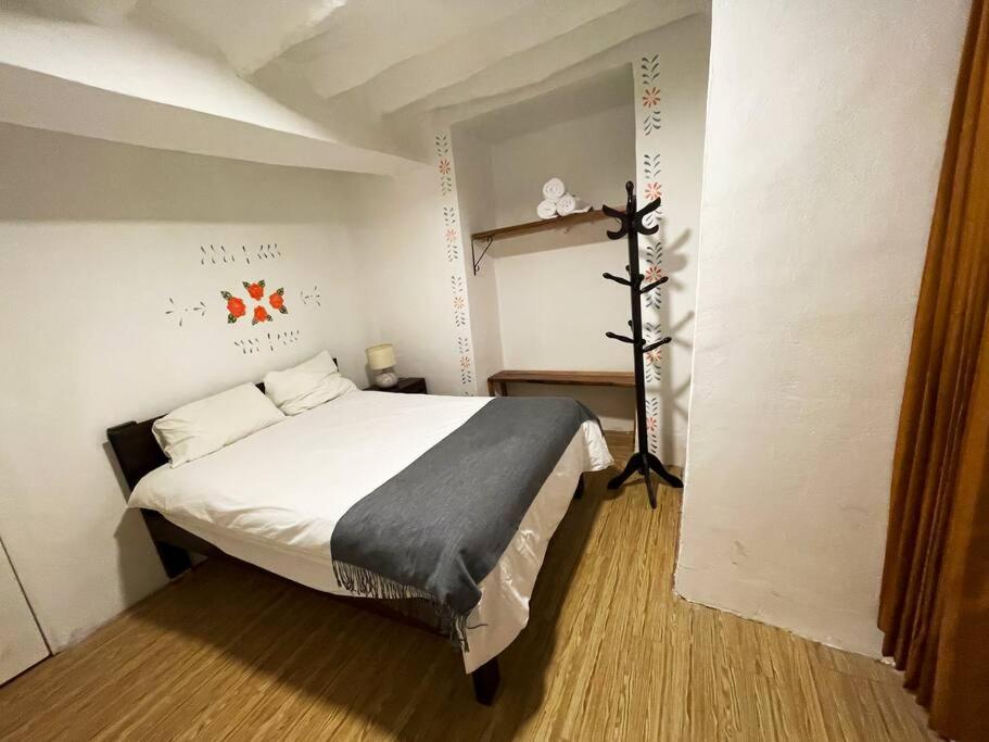 Postel nebo postele na pokoji v ubytování Casa Justina