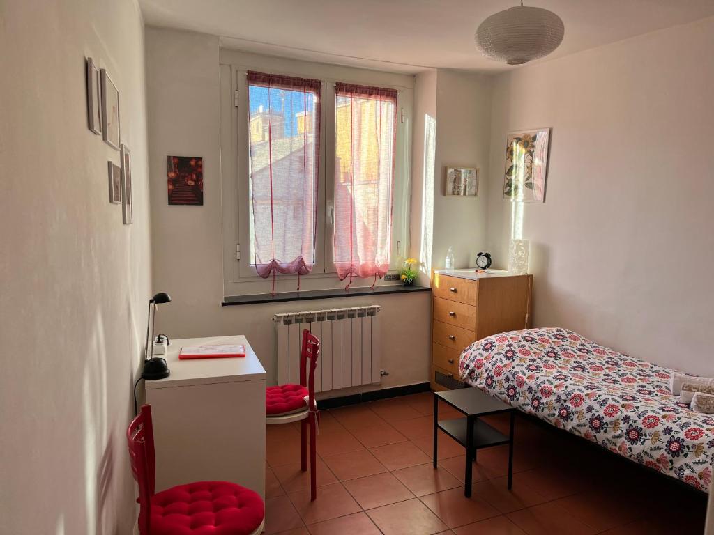 Postel nebo postele na pokoji v ubytování B&B Ligustico
