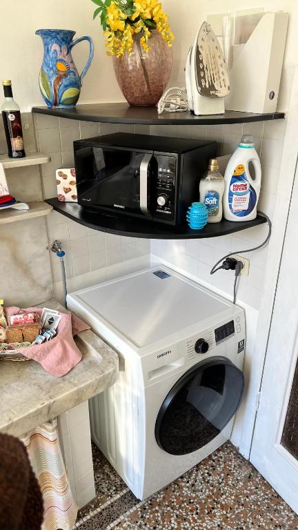 Kuchyň nebo kuchyňský kout v ubytování B&B Ligustico