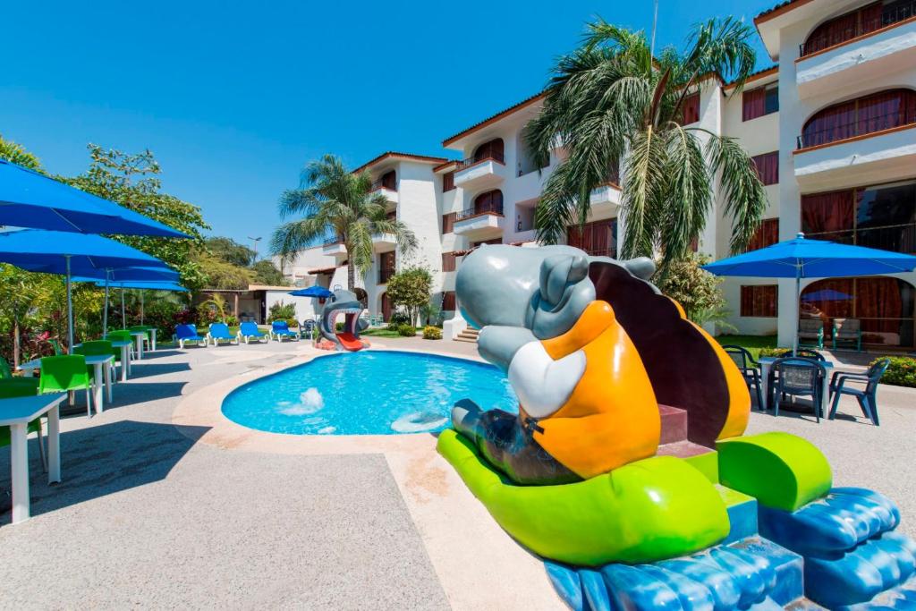 Bazén v ubytování Costa Club Punta Arena - Desayuno buffet incluido nebo v jeho okolí
