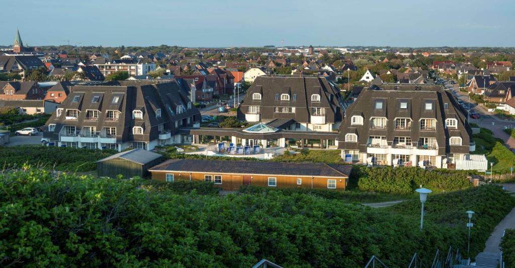 an aerial view of a city with houses at Dorint Strandresort & Spa Westerland/Sylt in Westerland