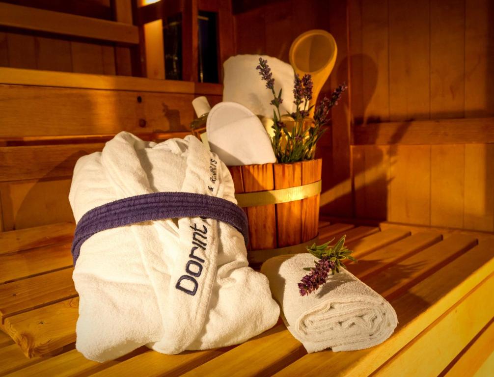 a couple of towels sitting on top of a table at Dorint Strandresort & Spa Westerland/Sylt in Westerland