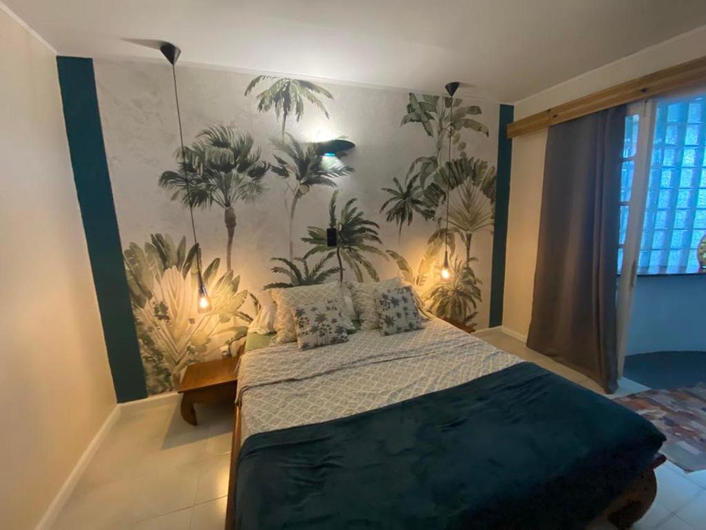 Postel nebo postele na pokoji v ubytování Ti Kaz Lo Ker chambre d'hôte chez l'habitant