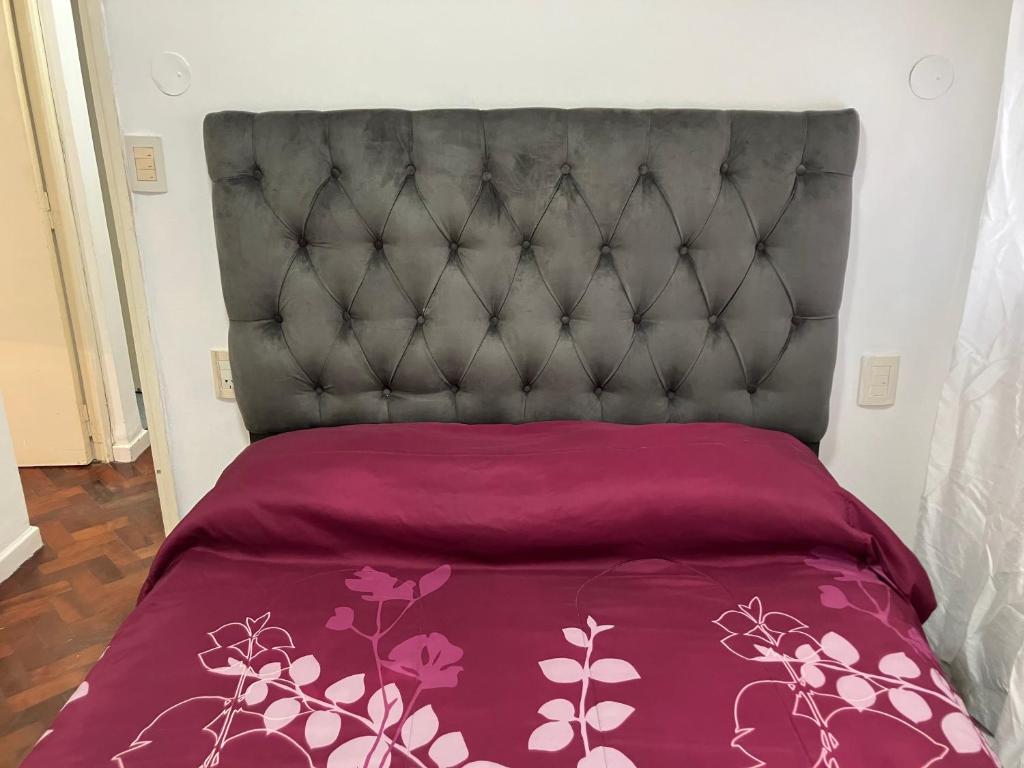 Ένα ή περισσότερα κρεβάτια σε δωμάτιο στο Departamento Centro Plaza 9 Julio