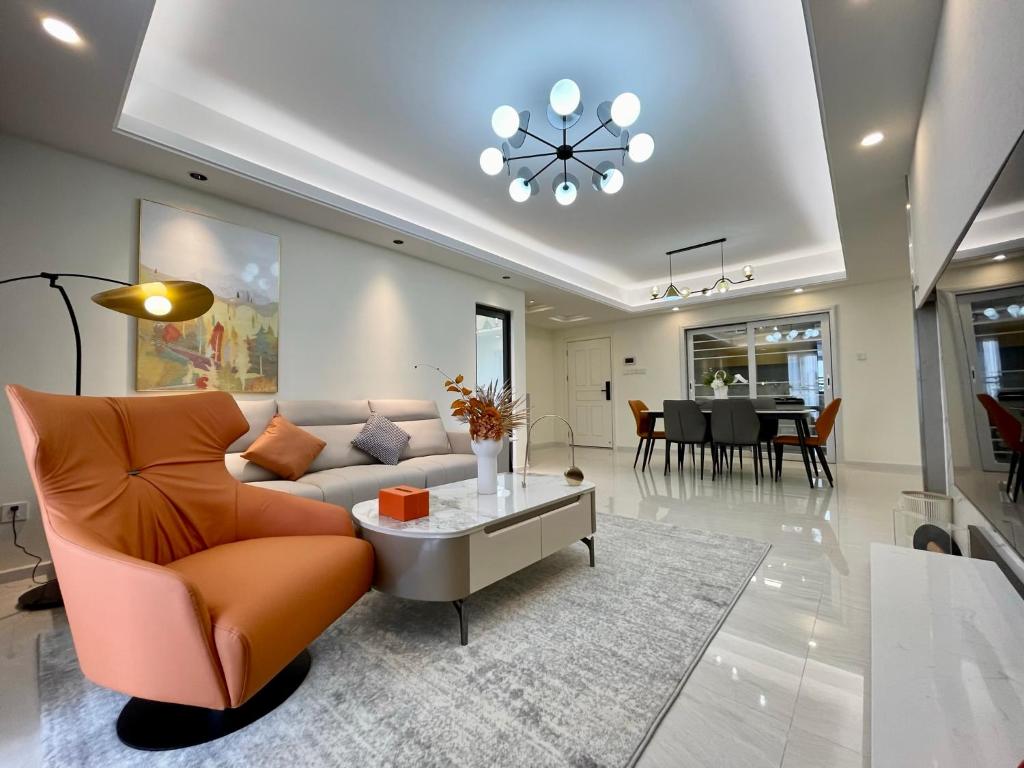a living room with a couch and a table at SKY 31 Luxurious Condominium in Phnom Penh