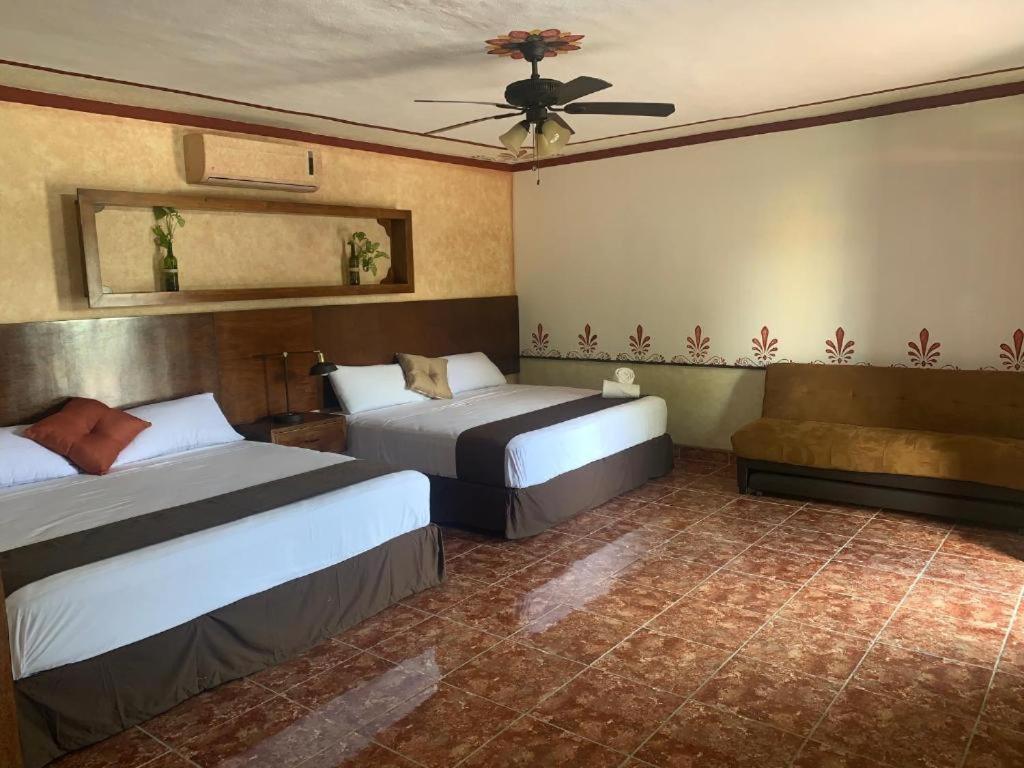 Postel nebo postele na pokoji v ubytování Hotel Tuul
