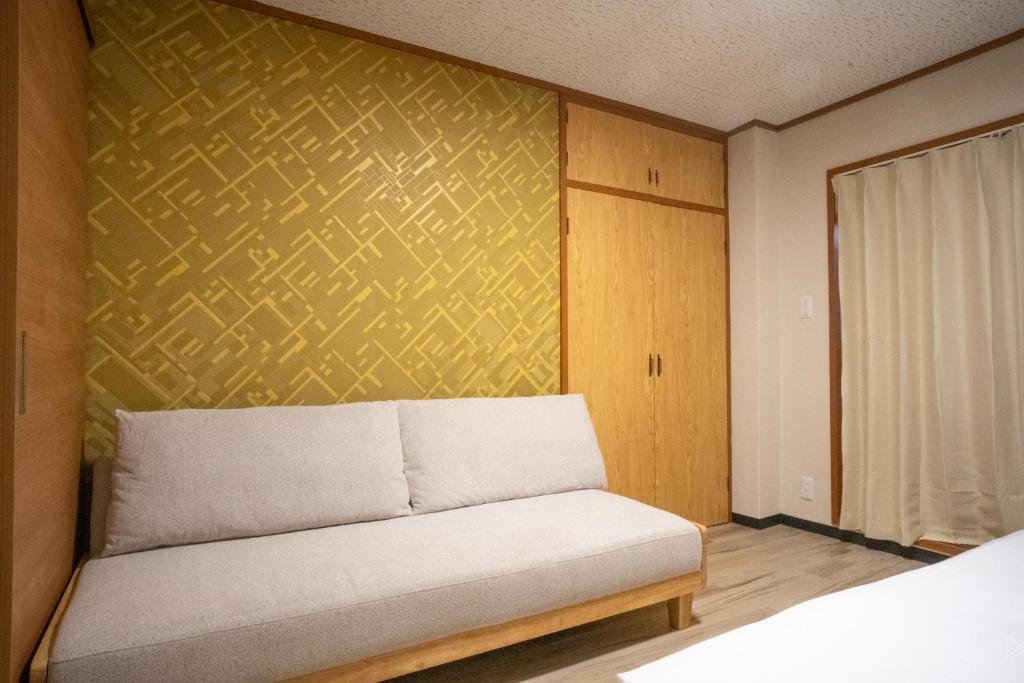 Postel nebo postele na pokoji v ubytování 殿堂