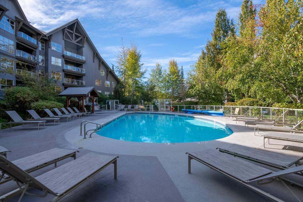 Ski in/Out Pet Friendly condo with Pool/3 Hot Tubs main image.