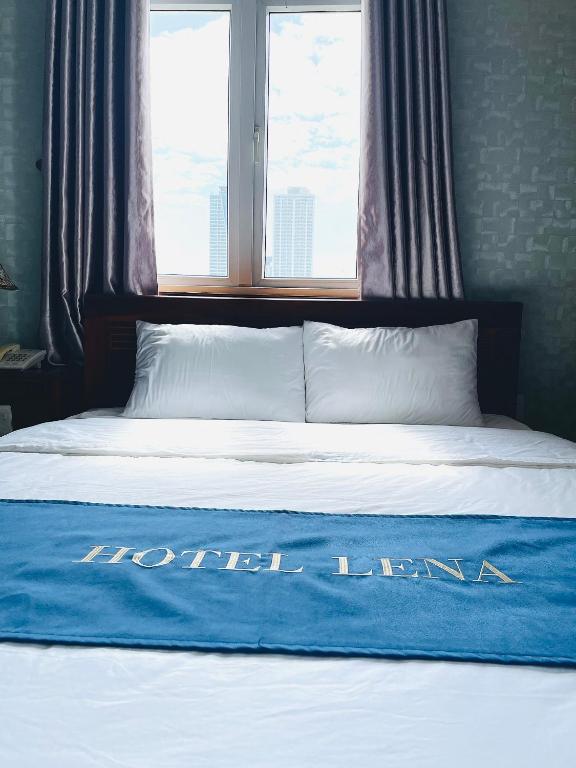 Postel nebo postele na pokoji v ubytování LENA HOTEL
