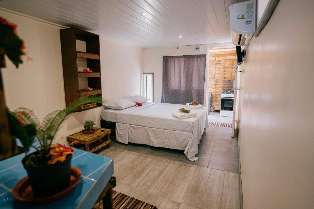 a bedroom with a bed in a room at Mianahere Studio Bora Bora in Bora Bora