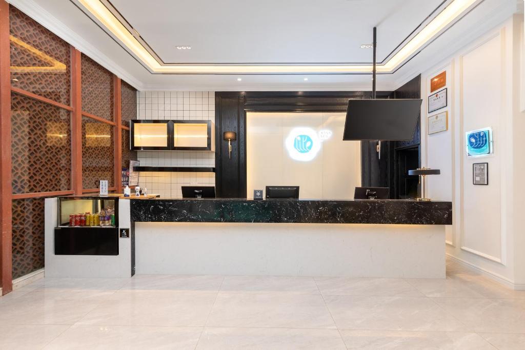 Kuchyň nebo kuchyňský kout v ubytování Xana Lite Hotel - Guangzhou Fangcun Huadiwan Metro Station