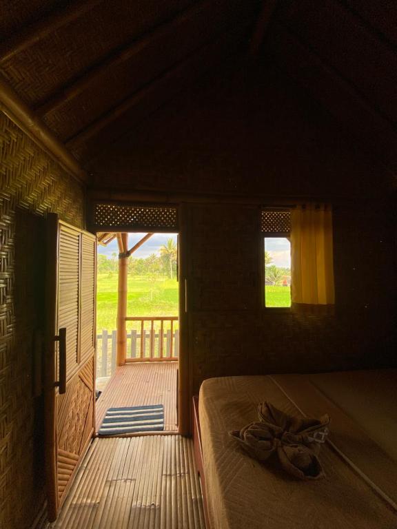 Postel nebo postele na pokoji v ubytování EDRIAN BUNGALOWS