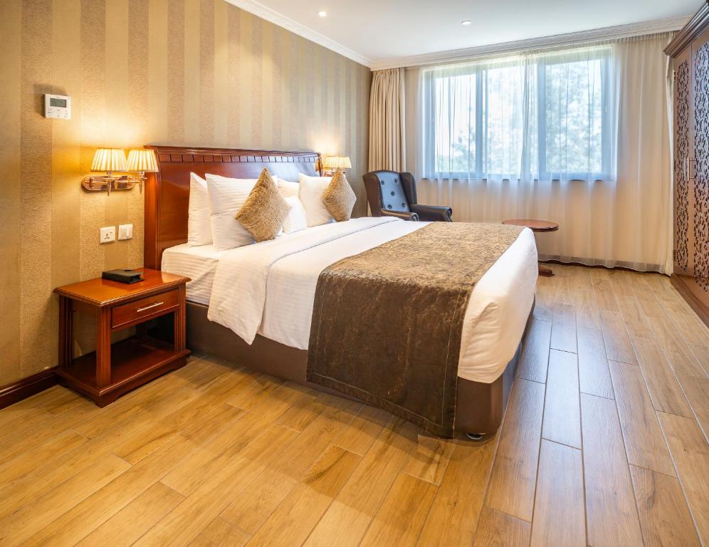 Postel nebo postele na pokoji v ubytování Sarova Woodlands Hotel and Spa