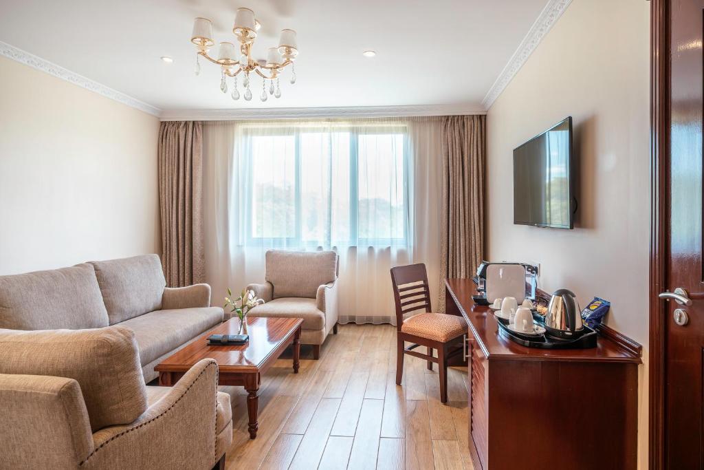 TV a/nebo společenská místnost v ubytování Sarova Woodlands Hotel and Spa