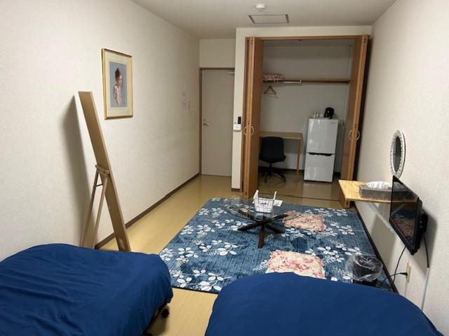ゲストハウス郡山にあるキッチンまたは簡易キッチン