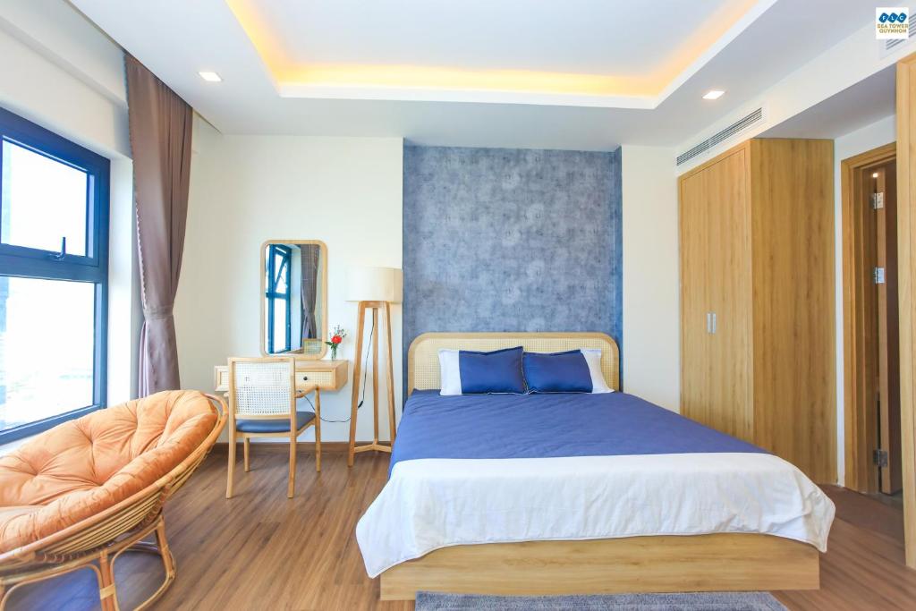 Postel nebo postele na pokoji v ubytování FLC Sea Tower - Căn Hộ Biển Quy Nhơn