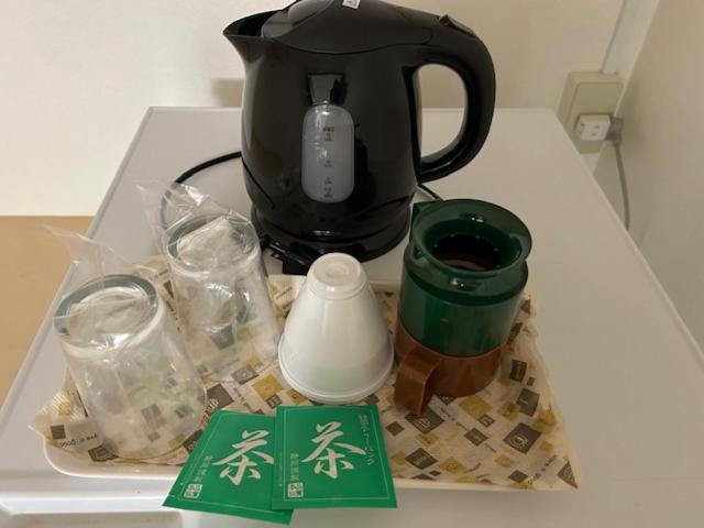 ゲストハウス郡山にあるコーヒーまたはお茶