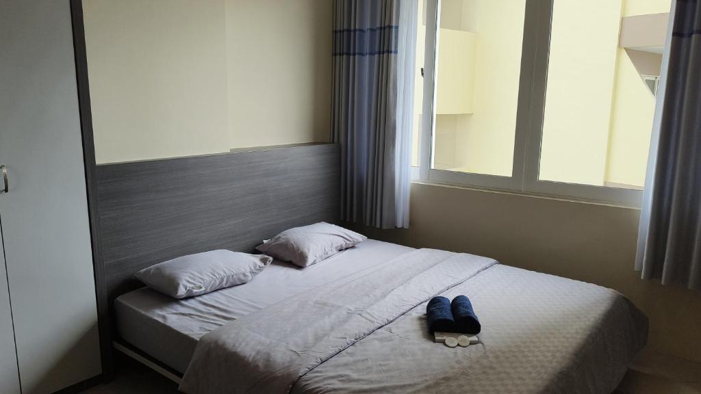 Postel nebo postele na pokoji v ubytování SleepRest @ NTC