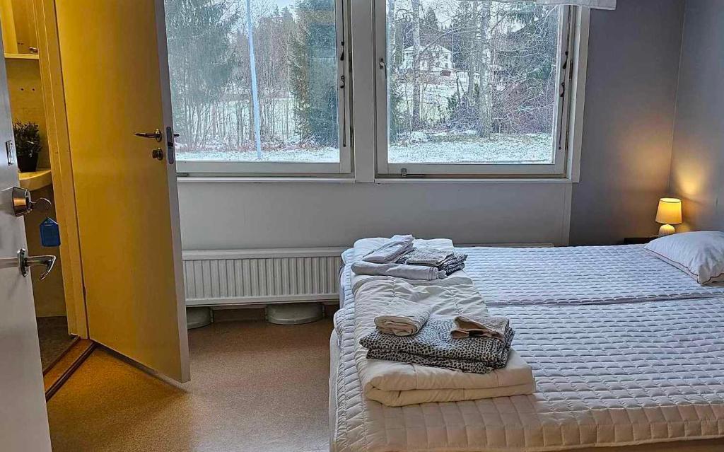 Postel nebo postele na pokoji v ubytování Näsbygården