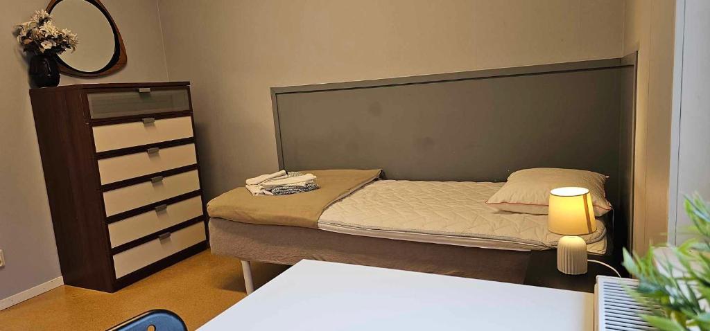 Postel nebo postele na pokoji v ubytování Näsbygården
