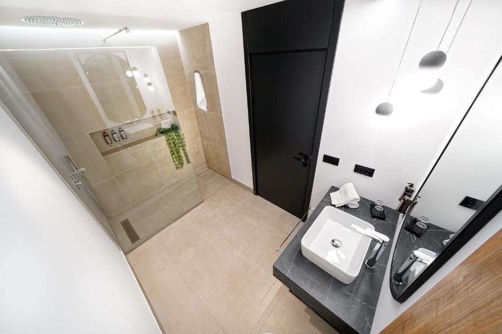 Kúpeľňa v ubytovaní Bull Vital Suites & Spa Boutique Hotel - Only Adults