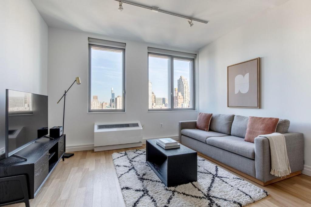 A seating area at Midtown West 1br w gym laundry nr park NYC-1311