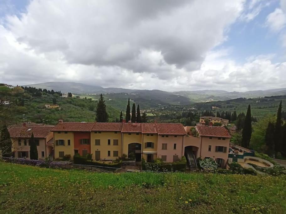 a large house on top of a hill at Noel's Room in Fiesole