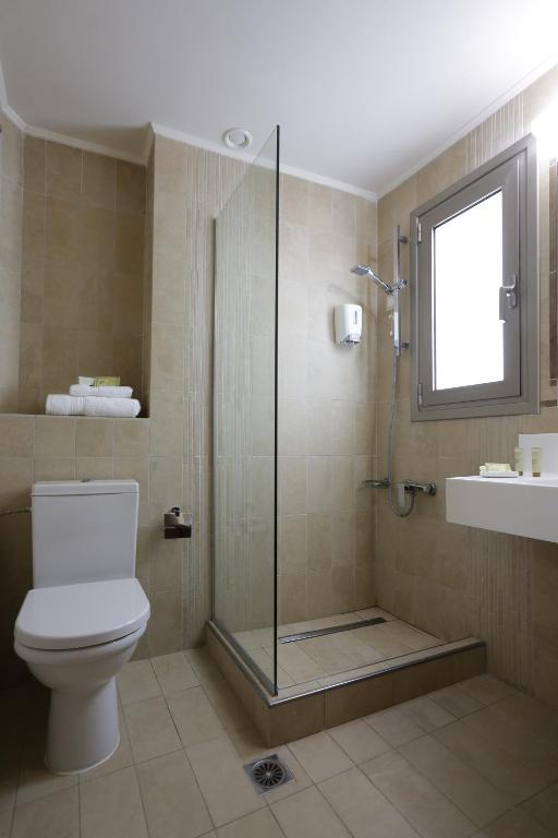 Koupelna v ubytování Almira Hotel