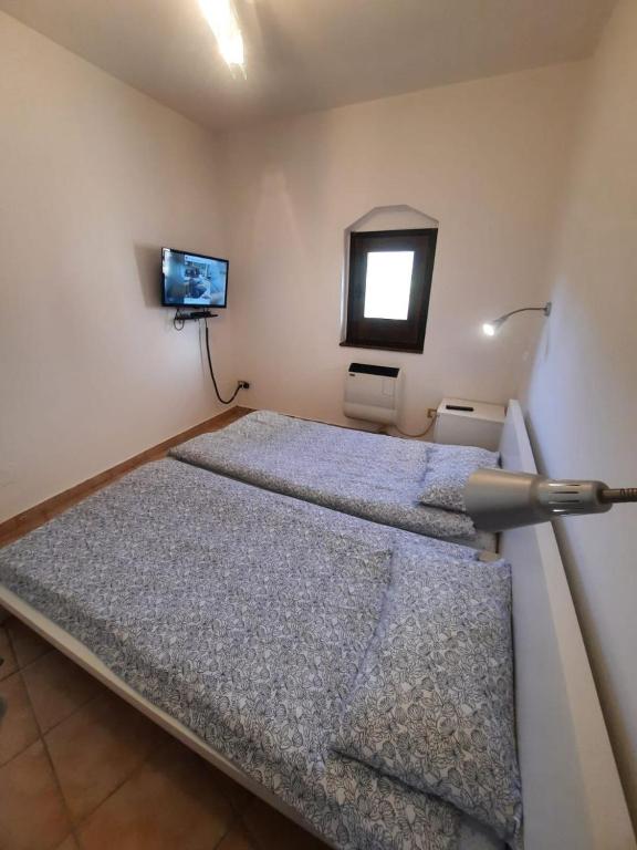 Postel nebo postele na pokoji v ubytování Lorica Apartment Residence LagoSila