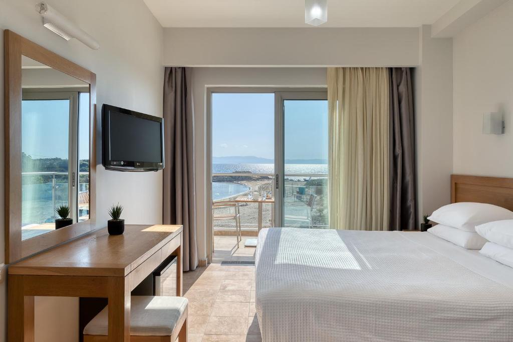 Postel nebo postele na pokoji v ubytování Almira Hotel