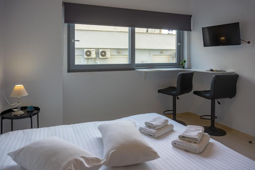 Posteľ alebo postele v izbe v ubytovaní Nest Port View Apartment
