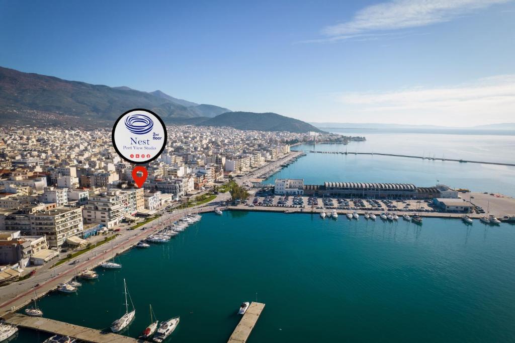 an aerial view of a city with a marina at Nest Port View Apartment in Volos