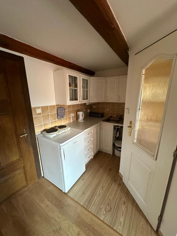 Kuchyň nebo kuchyňský kout v ubytování Apartment Dehtáře
