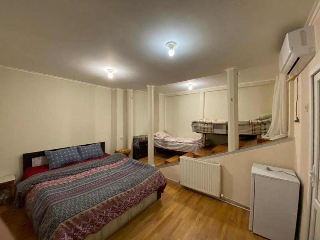 Postel nebo postele na pokoji v ubytování T Rooms
