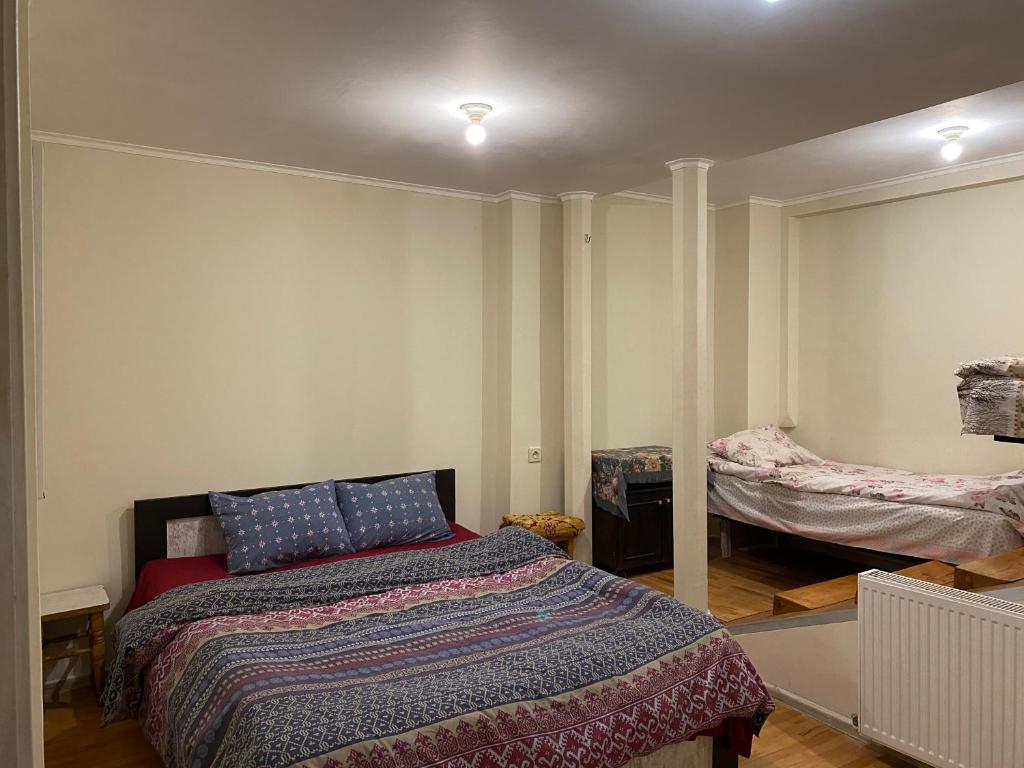 Postel nebo postele na pokoji v ubytování T Rooms