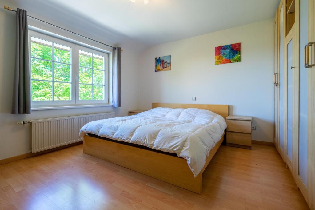 Postel nebo postele na pokoji v ubytování Au Paradis 6+2 pers villa