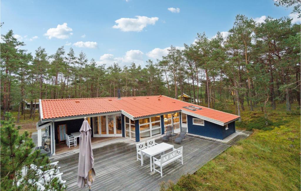 an overhead view of a house with a deck at Stunning Home In Nex With Kitchen in Vester Sømarken