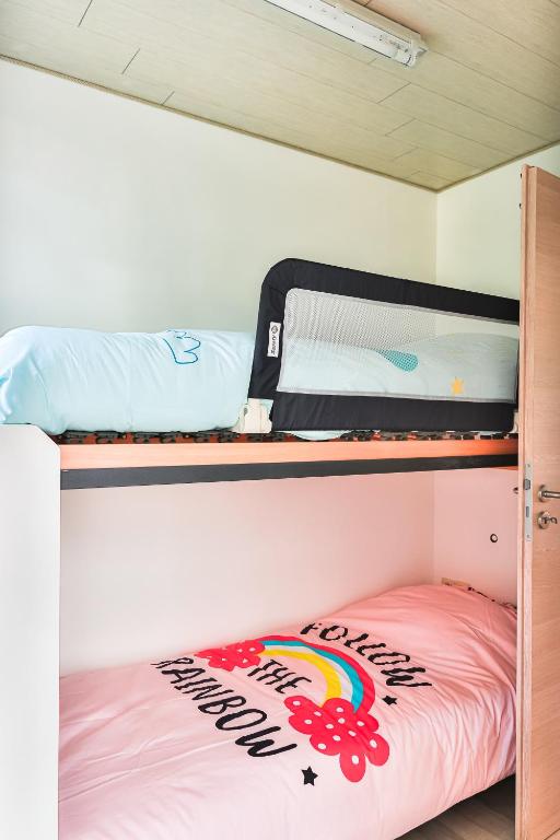 Postel nebo postele na pokoji v ubytování Tinyhouses - Domain "La vallée des Prés"