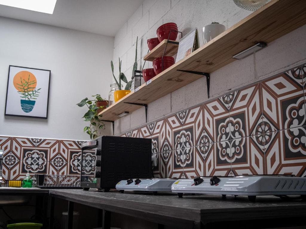 Kuchyň nebo kuchyňský kout v ubytování Lolas Hostal, Habitacion Exclusiva para Mujeres, 2 camarotes, precio por cama