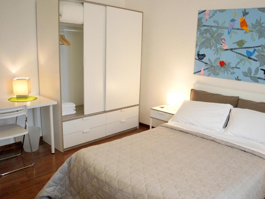 Postel nebo postele na pokoji v ubytování B&B Villa Paradiso