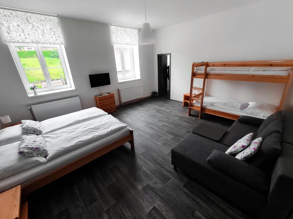 Postel nebo postele na pokoji v ubytování Apartmány u Maxíků