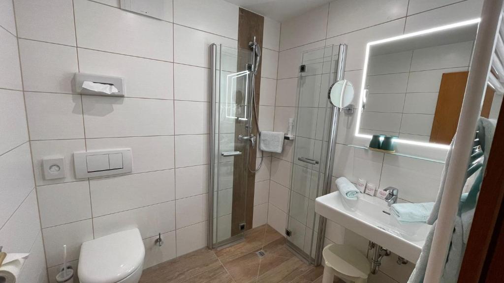 Koupelna v ubytování Apparthotel Samson
